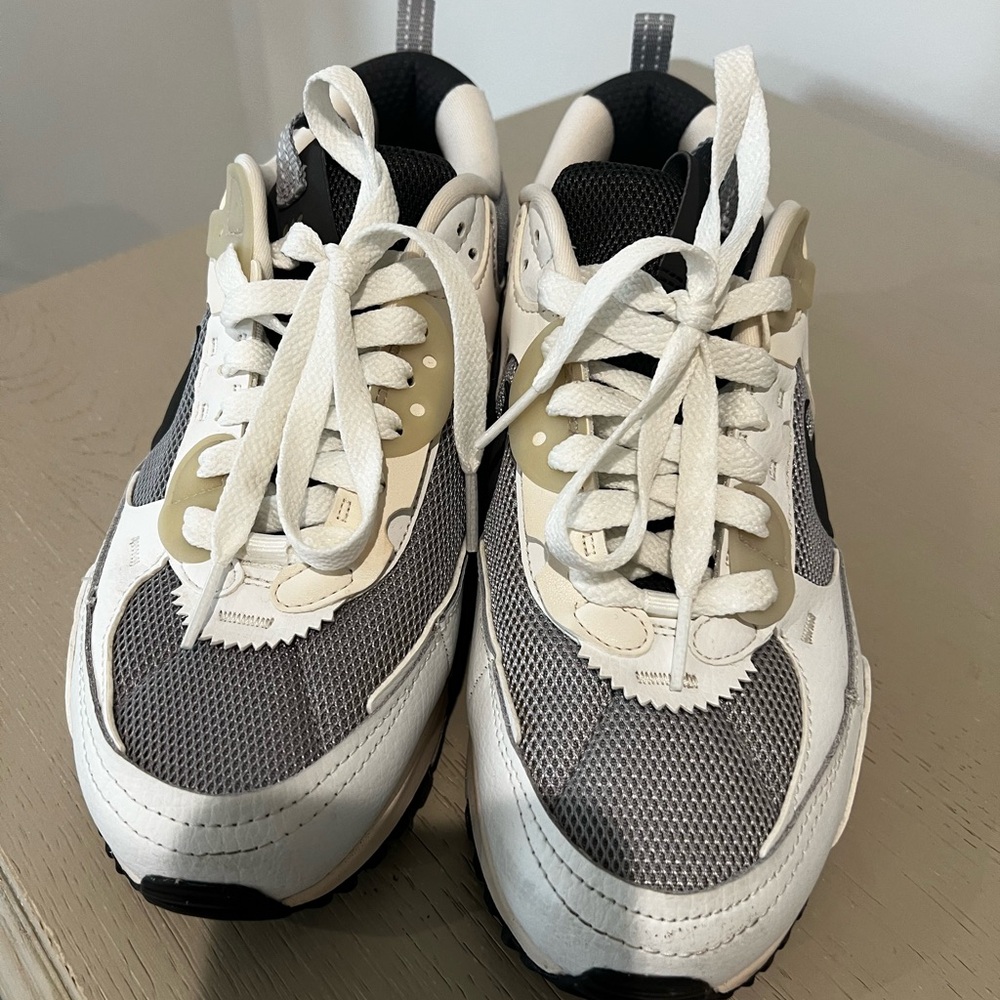 Nike Athletic Shoes in Black, White, and Cream